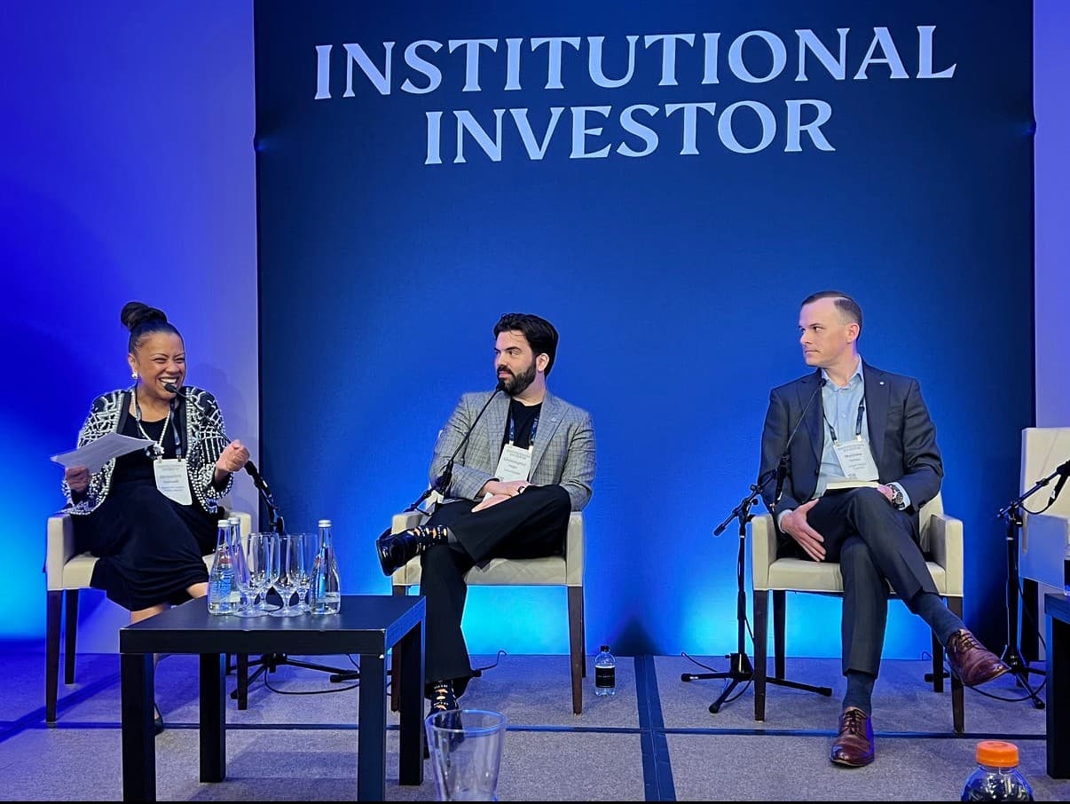 Matthew Snider on a panel at an Institutional Investor event