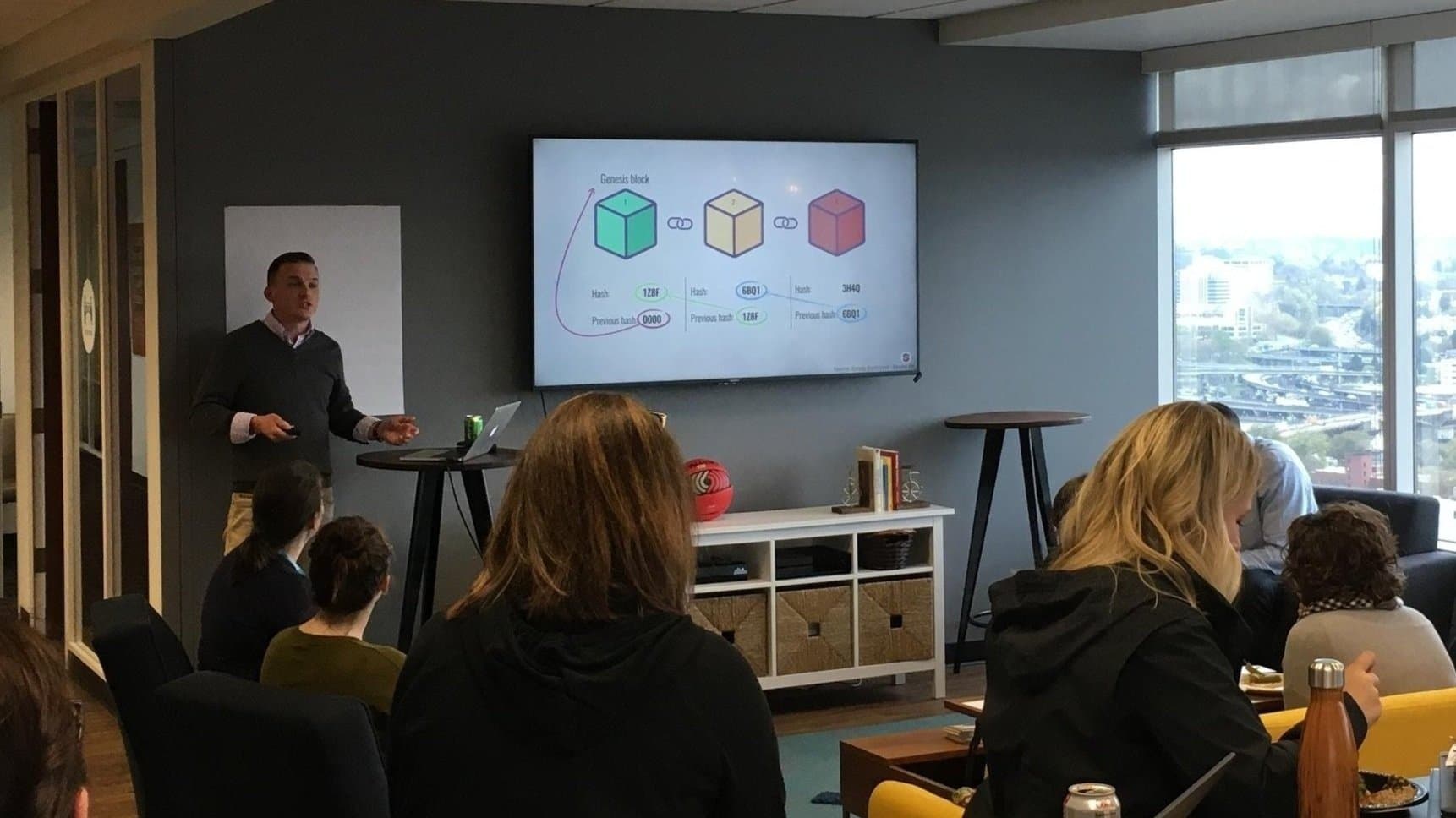 Matthew Snider presenting on how blockchains link blocks together