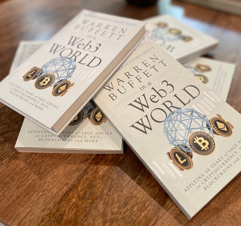 Books stacked on wooden table